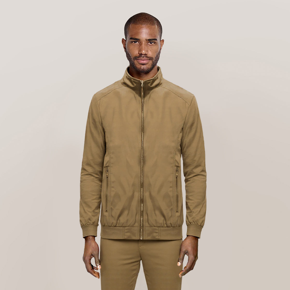 Yellow # Men's lightweight outdoor zipper windbreaker jacket with stand collar and long sleeves, softshell casual coat with 2 zipper pockets and ribbed knit cuffs, fully lined yellow jacket for business, daily wear, golf and outdoor activities, isolated on white background.