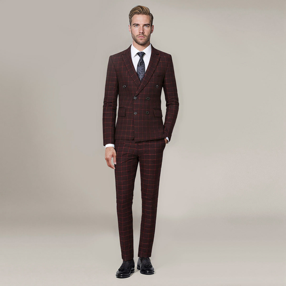 Red # Men's slim fit 3-piece double breasted plaid suit with notched lapel and button closure, red checkered formal blazer jacket with four-button cuffs, matching vest and flat-front trousers with extended waist strap, elegant polyester suit for wedding, business, prom and formal occasions, isolated on white background.
