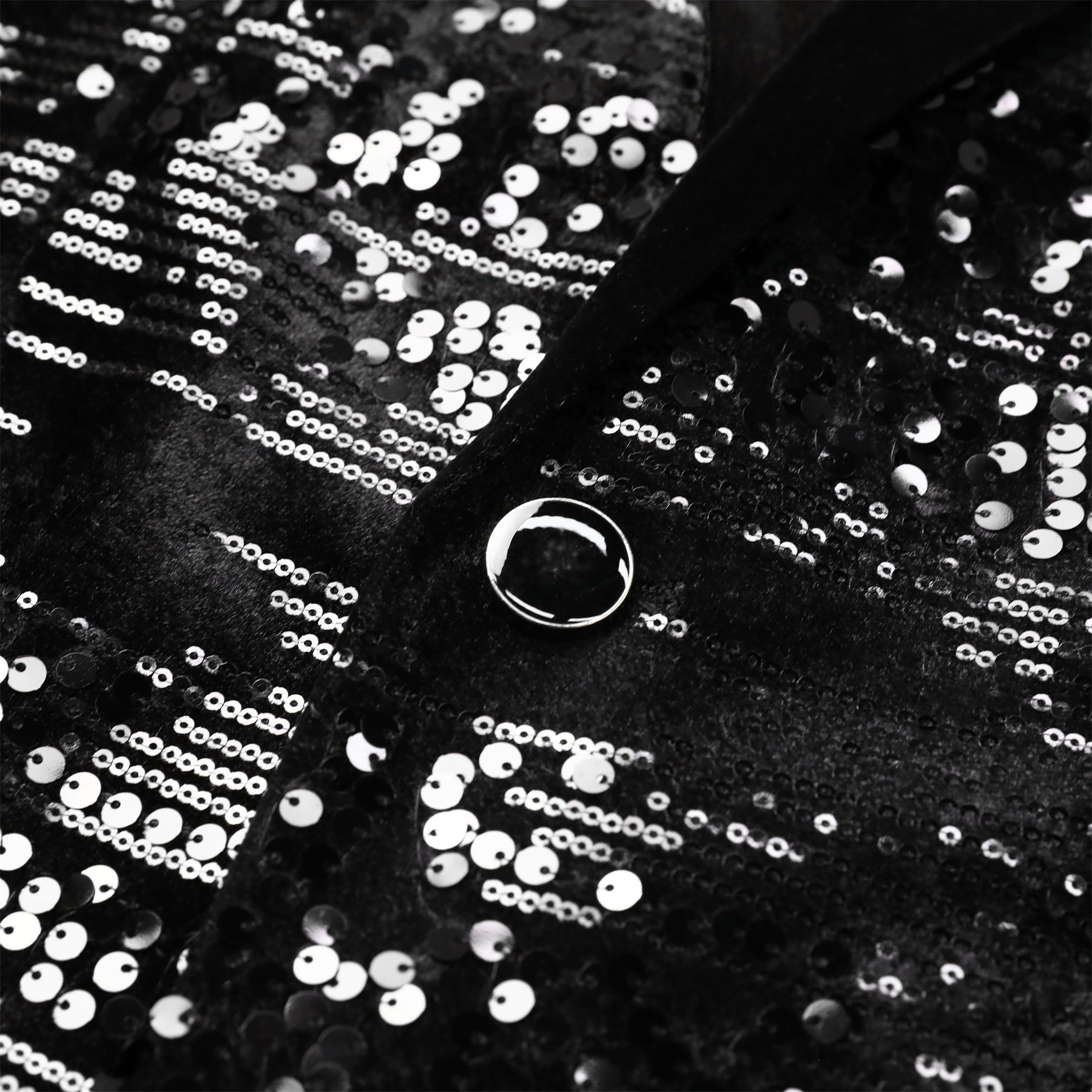 Black # Men's shiny sequin suit jacket with velvet shawl lapel and one-button closure, tailored-fit tuxedo blazer with sparkling black sequins for dinner party, prom, cocktail, wedding, and stage performance, isolated on white background.