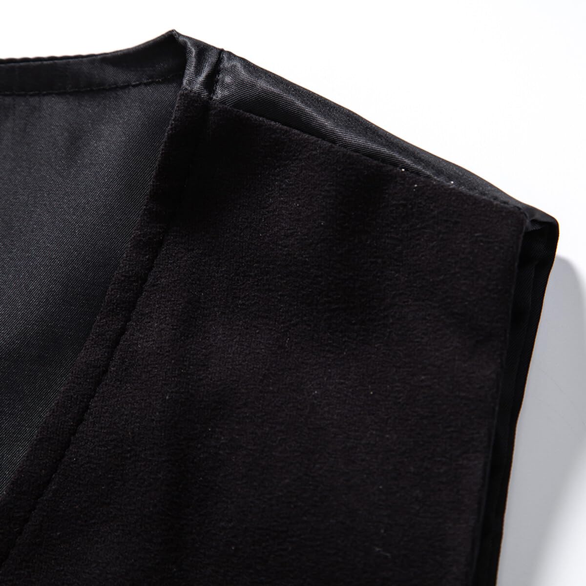 Black # Men's slim fit V-neck solid casual suit vest, button-down waistcoat with belt-on back and buckle closure, soft lightweight anti-wrinkle polyester fabric, versatile dress vest for daily wear, business, wedding, party and formal events, isolated on white background.