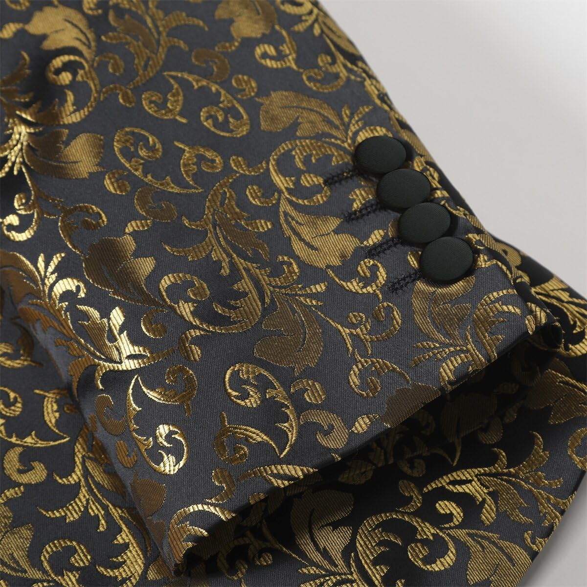 Golden # Men's floral jacquard dress suit blazer with black shawl collar and center vent, 3D tailored fit gold blazer jacket with exquisite floral print, one chest pocket and two side flap pockets, perfect for party, prom, wedding, banquet and celebration events, isolated on white background.