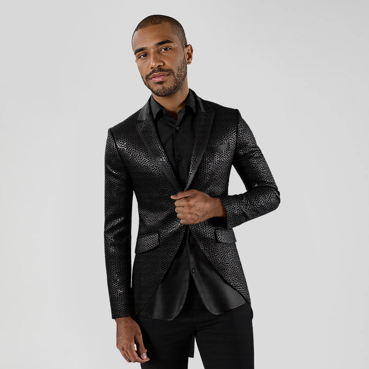 Black # Men's slim fit single-breasted sequin decorated swallowtail coat with peaked lapel and button closure, black sparkle tuxedo tailcoat with shining sequins for party, prom, stage performance, wedding and special events, isolated on white background.