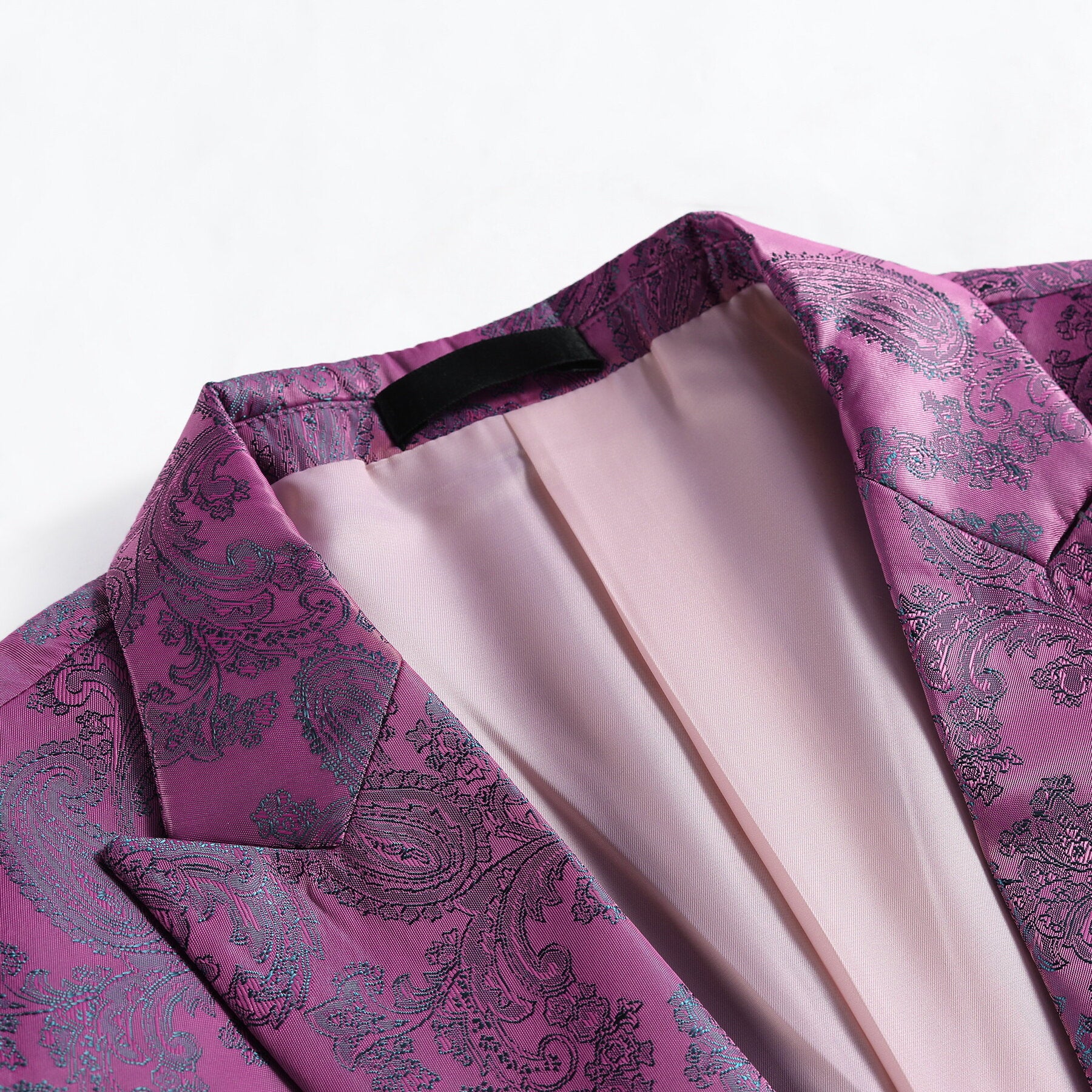 Fuchsia # Men's slim fit 2-piece paisley fashion suit with notch lapel and single-breasted button closure, fuchsia patterned formal blazer jacket with four-button cuffs and fully lined interior, matching flat-front trousers for party, wedding, prom and special occasions, isolated on white background.