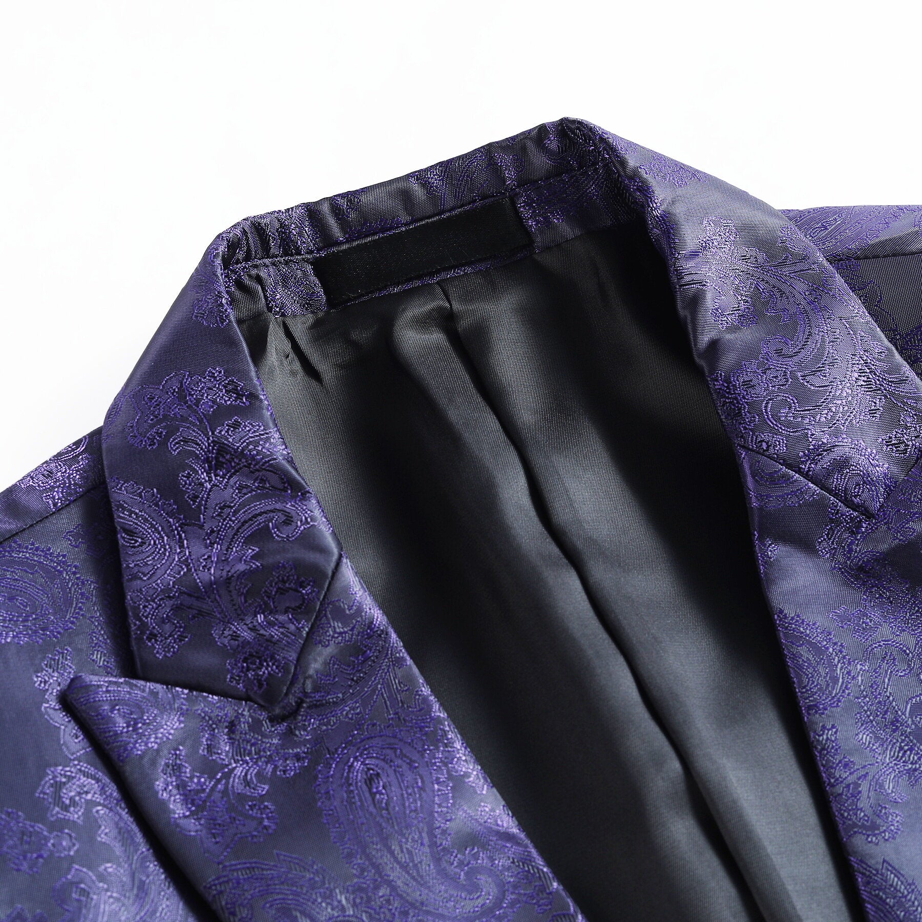 Purple # Men's slim fit 2-piece paisley fashion suit with notch lapel and single-breasted button closure, purple patterned formal blazer jacket with four-button cuffs and fully lined interior, matching flat-front trousers for party, wedding, prom and special occasions, isolated on white background.