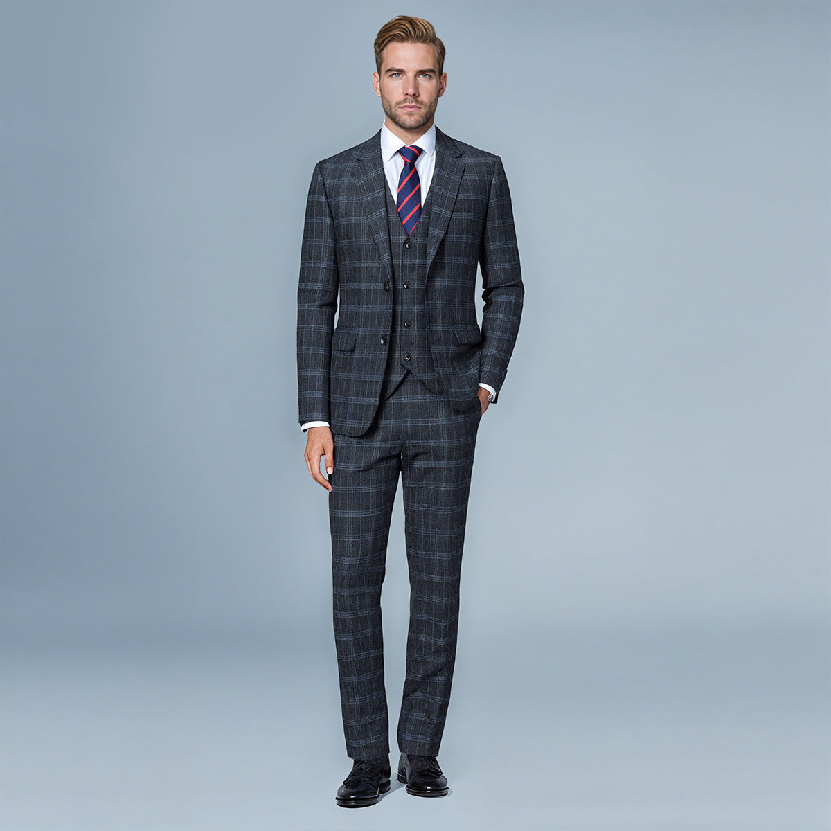 Black # Men's 3-piece slim fit vintage plaid suit with peaked lapel and button closure, black checkered formal blazer jacket with matching vest and flat-front trousers with extended waist strap and slanted side pockets, elegant polyester viscose blend vintage suit for business, wedding, office and daily wear, isolated on white background.