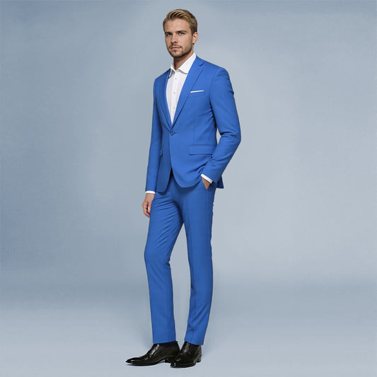 Blue # Men's slim fit 2-piece suit with peaked lapel and simple elegant design, blue formal blazer jacket with four-button cuffs and matching flat-front trousers with extended waist strap for business, office, wedding and daily wear, isolated on white background.