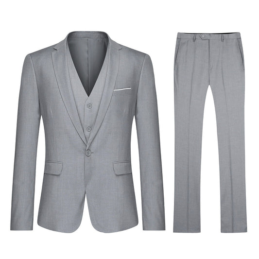 Light Grey # Men's 3-piece one-button slim fit formal suit with peaked lapel and button closure, light grey classic blazer jacket with matching vest and flat-front trousers with extended waist strap, elegant polyester suit for business, wedding, office and formal occasions, isolated on white background.