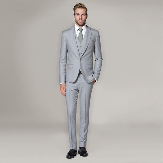 Light Grey # Men's 3-piece one-button slim fit formal suit with peaked lapel and button closure, light grey classic blazer jacket with matching vest and flat-front trousers with extended waist strap, elegant polyester suit for business, wedding, office and formal occasions, isolated on white background.