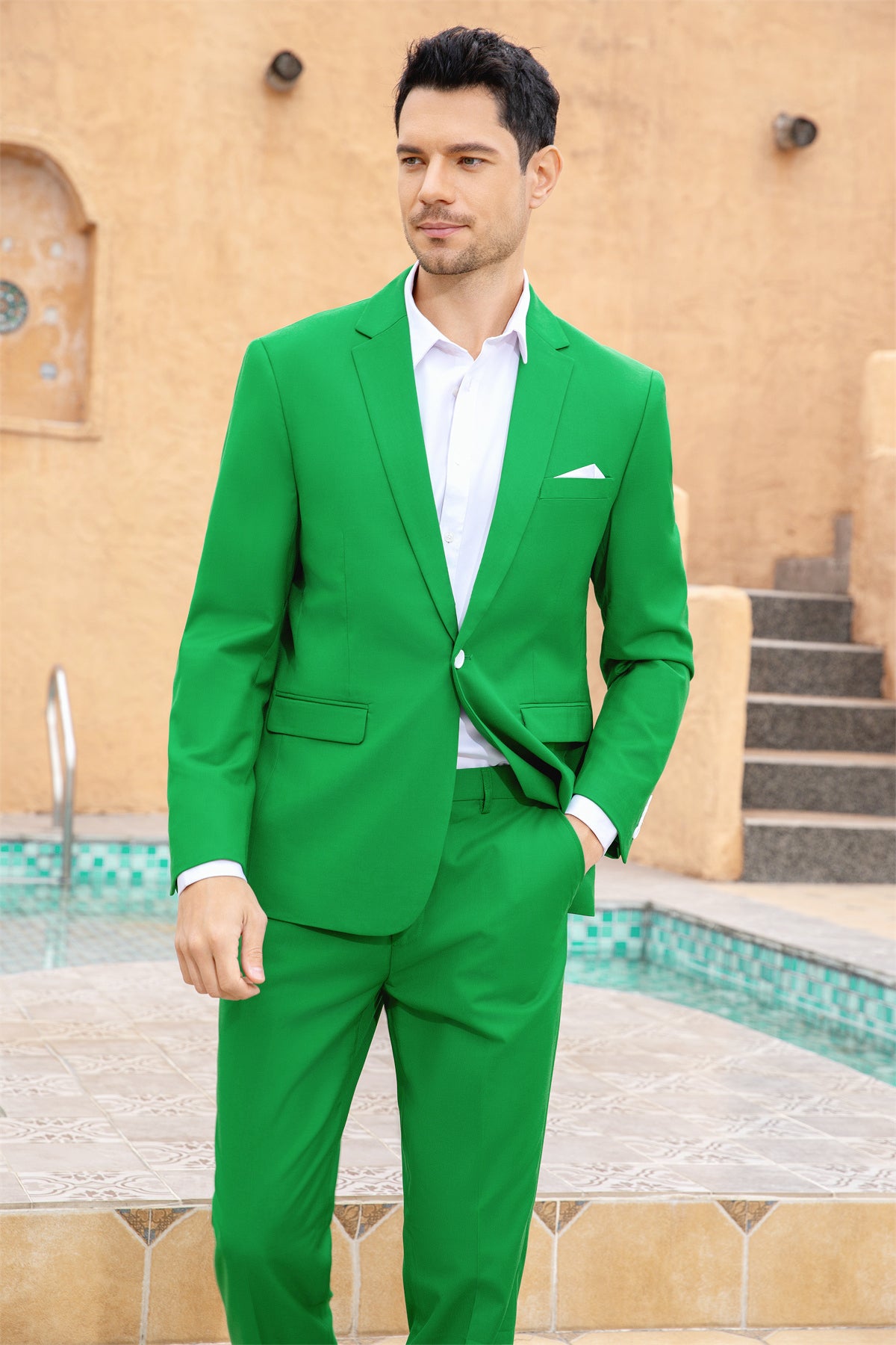 Green # Men's slim fit 2-piece simple designed casual suit with peaked lapel and button closure, green formal blazer jacket with four-button cuffs and matching flat-front trousers with extended waist strap, elegant polyester viscose blend suit for business, office, wedding and daily wear, isolated on white background.