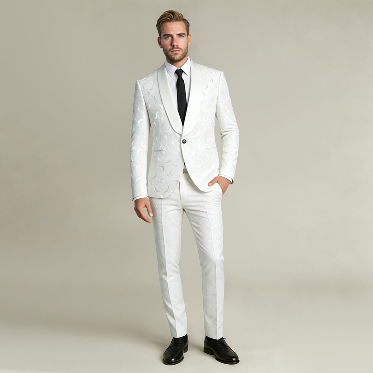 White # Men's slim fit 2-piece paisley suit with satin peaked lapel and single-breasted button closure, white patterned formal blazer jacket with center vent and fully lined interior, matching flat-front trousers, elegant polyester viscose blend suit for wedding, prom, party and formal occasions, isolated on white background.