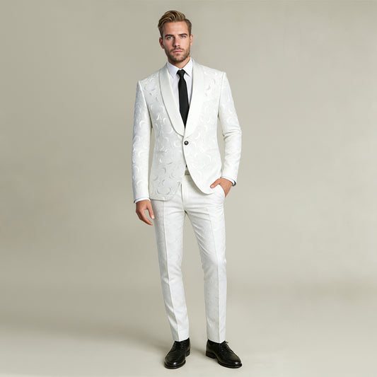 White # Men's slim fit 2-piece paisley suit with satin peaked lapel and single-breasted button closure, white patterned formal blazer jacket with center vent and fully lined interior, matching flat-front trousers, elegant polyester viscose blend suit for wedding, prom, party and formal occasions, isolated on white background.