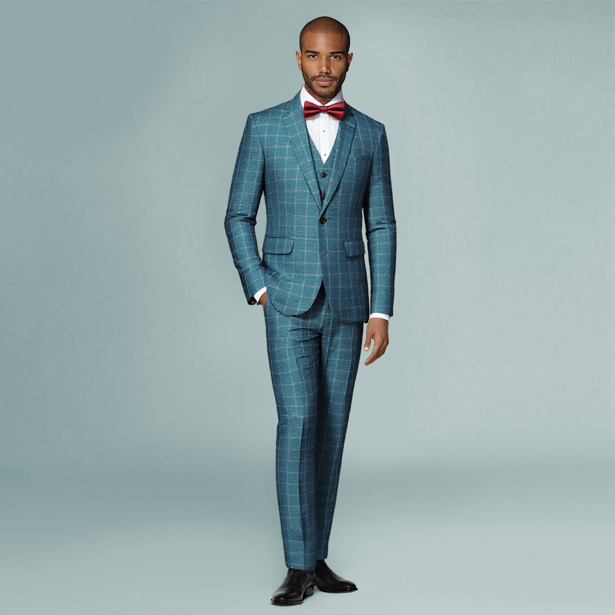 Blue Plaid # Men's slim fit 3-piece modern plaid suit with peaked lapel and button closure, blue checkered formal blazer jacket with matching vest and flat-front trousers with extended waist strap and slanted side pockets, elegant polyester viscose spandex blend suit for business, wedding, office and daily wear, isolated on white background.