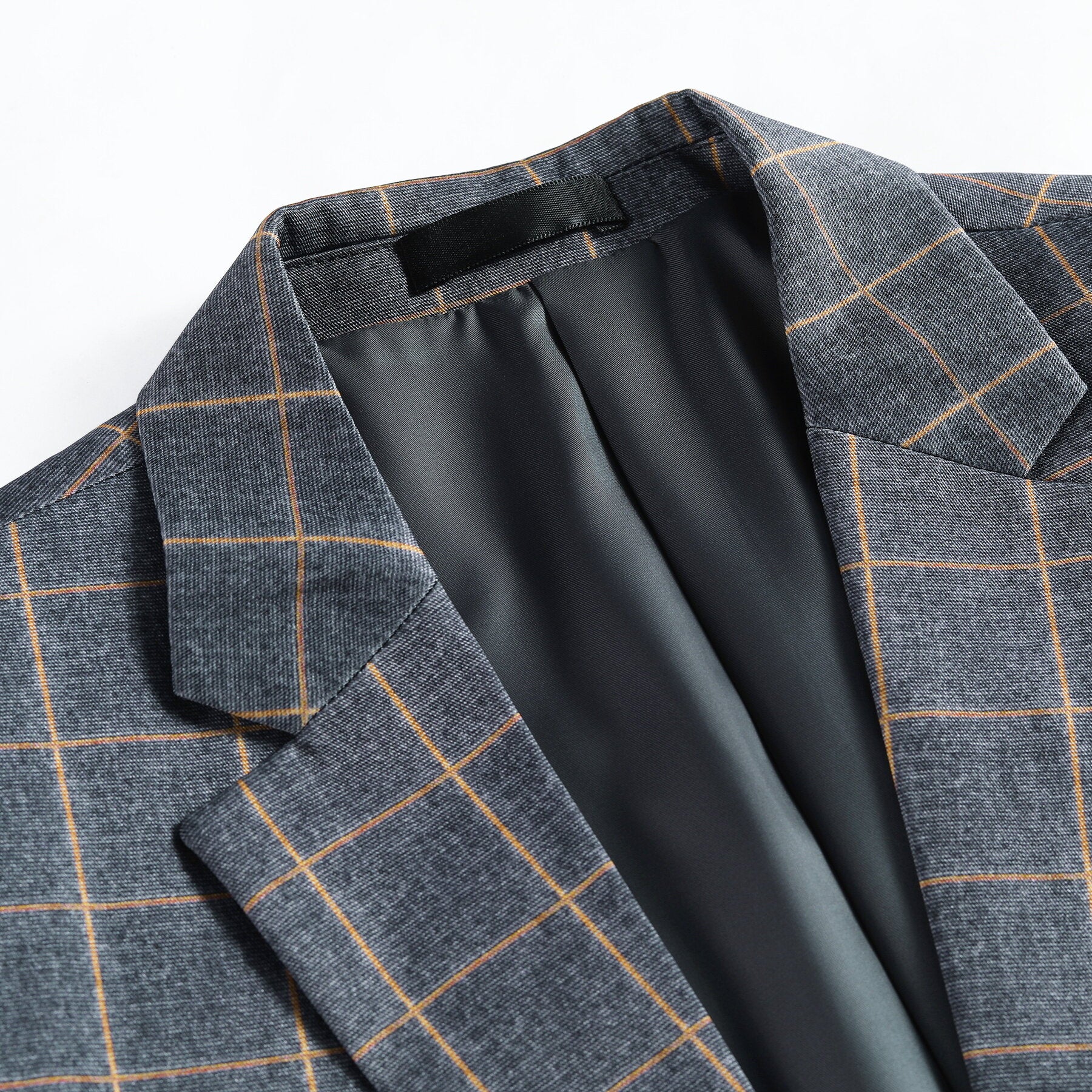 Grey Plaid # Men's slim fit 3-piece grey plaid modern suit with peaked lapel and button closure, classic tailored blazer jacket with matching vest and flat-front trousers with extended waist strap, elegant formal wear for business, wedding, prom and daily occasions, isolated on white background.