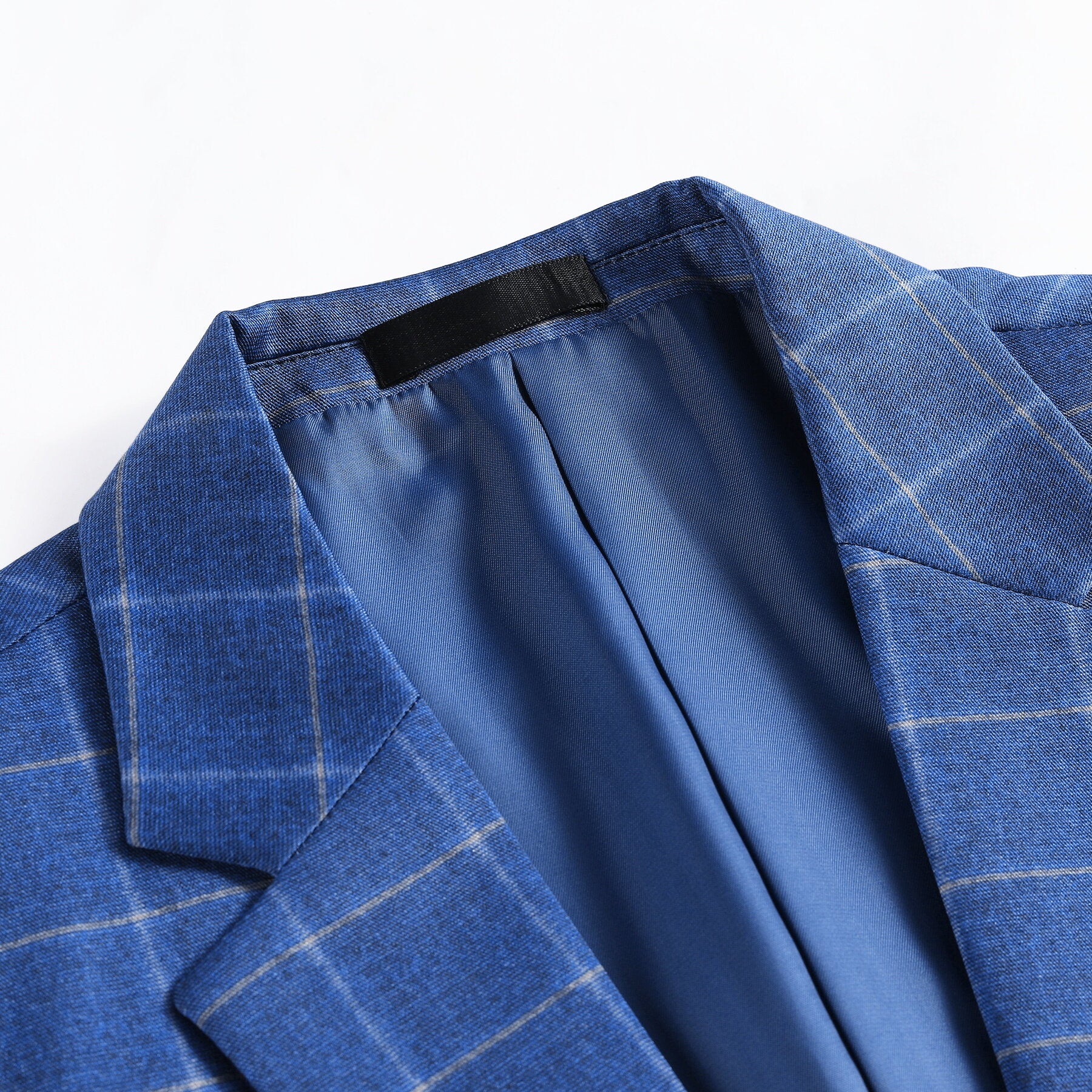 Royal Blue # Men's slim fit 3-piece royal blue plaid modern suit with peaked lapel and button closure, stylish blue checkered formal blazer jacket with matching vest and flat-front trousers with extended waist strap for business, wedding, prom and daily wear, isolated on white background.