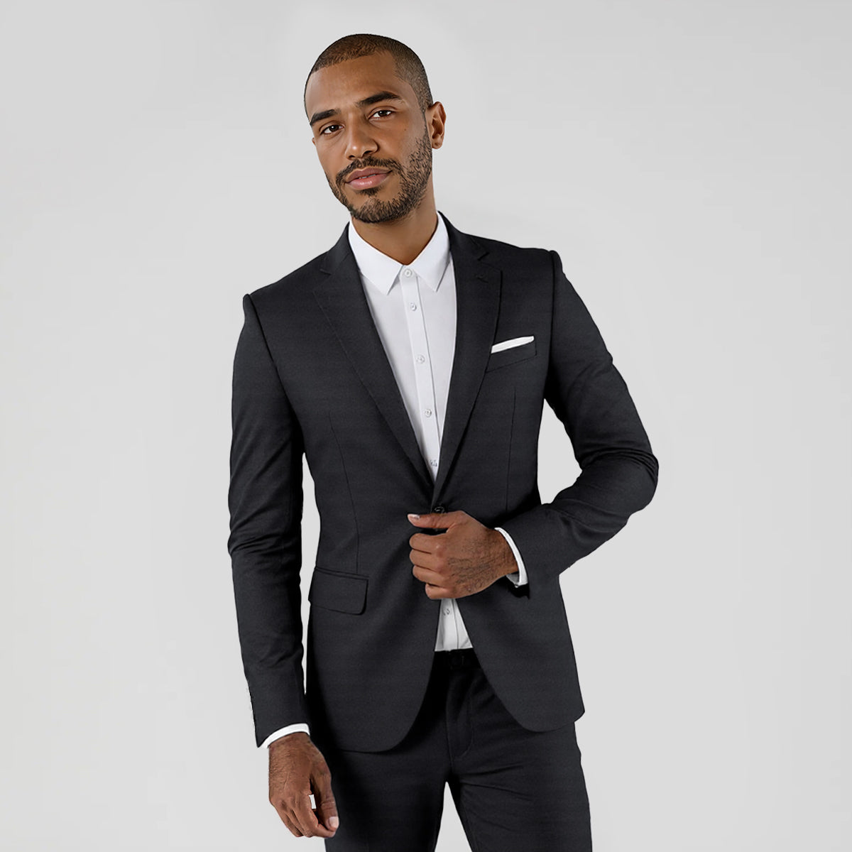 Black # Men's slim fit casual daily blazer with notched lapel and buttoned cuffs, black sport coat featuring 3D tailored fit, full shoulder design, floral pocket square, 1 inner pocket and 2 side flap pockets, versatile polyester jacket for business, office, party, prom, wedding and daily wear, isolated on white background.