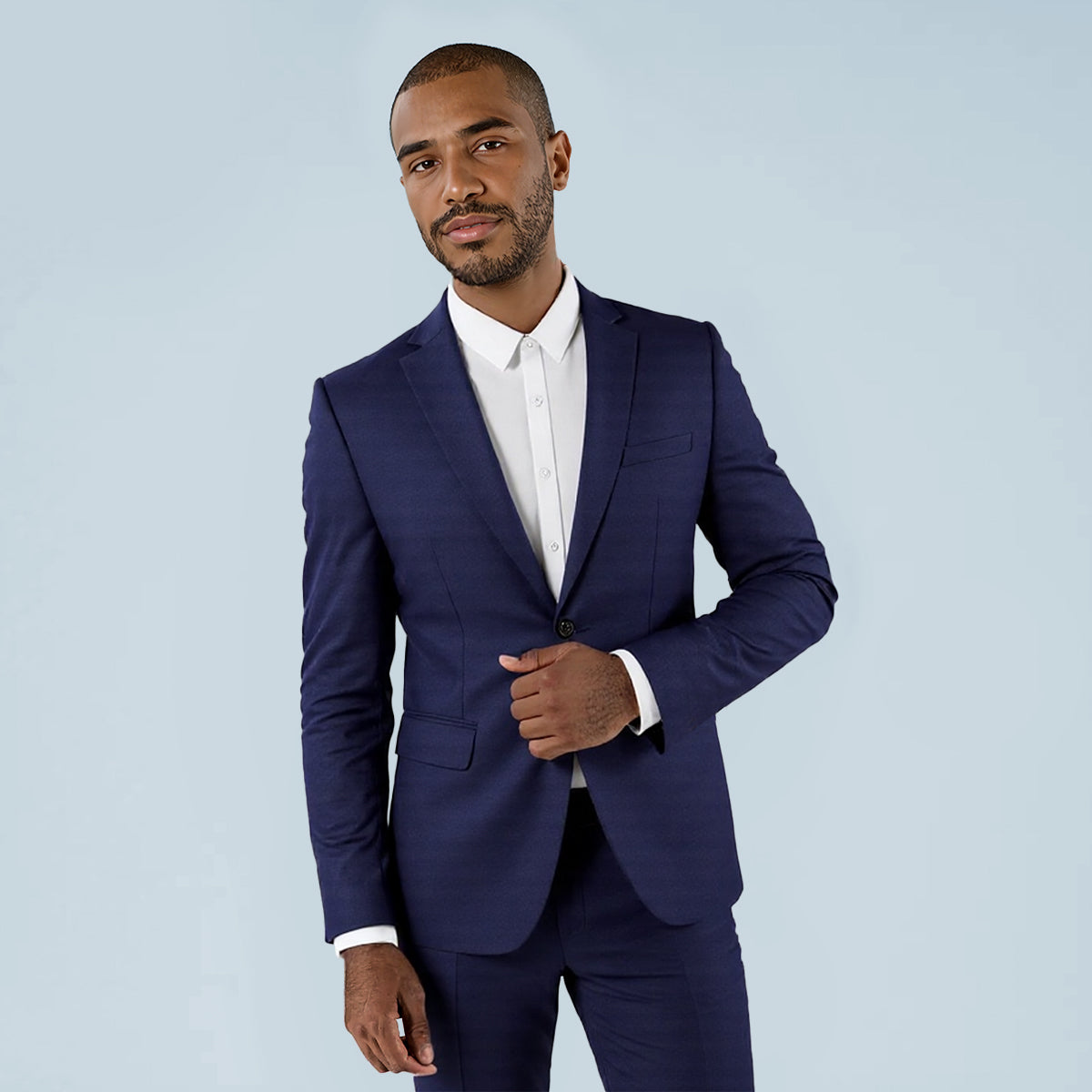 Navy # Men's slim fit casual blazer with notched lapel and 3D tailored cut, navy blue daily sport coat with buttoned cuffs, chest pocket with fixed floral pocket-square, two side flap pockets and one inner pocket for business, office, party, wedding and daily wear, isolated on white background.