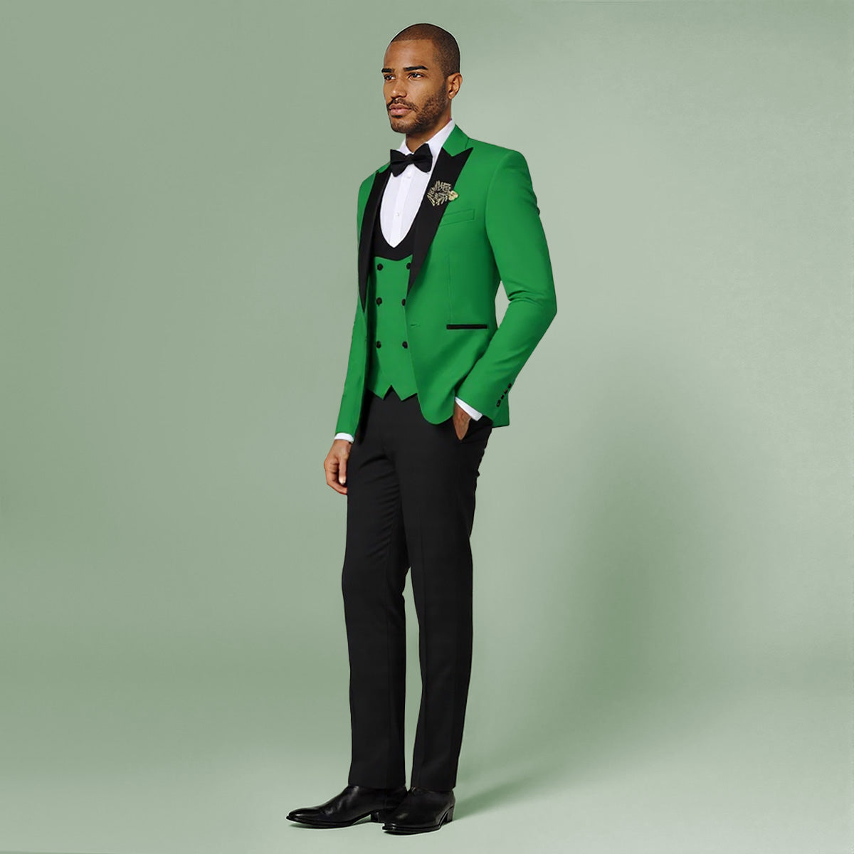Green # Men's 3-piece one-button slim fit tuxedo suit with peaked lapel and button closure, green formal blazer jacket with matching vest and flat-front trousers with extended waist strap, elegant polyester viscose blend wedding suit for prom, business and formal occasions, isolated on white background.