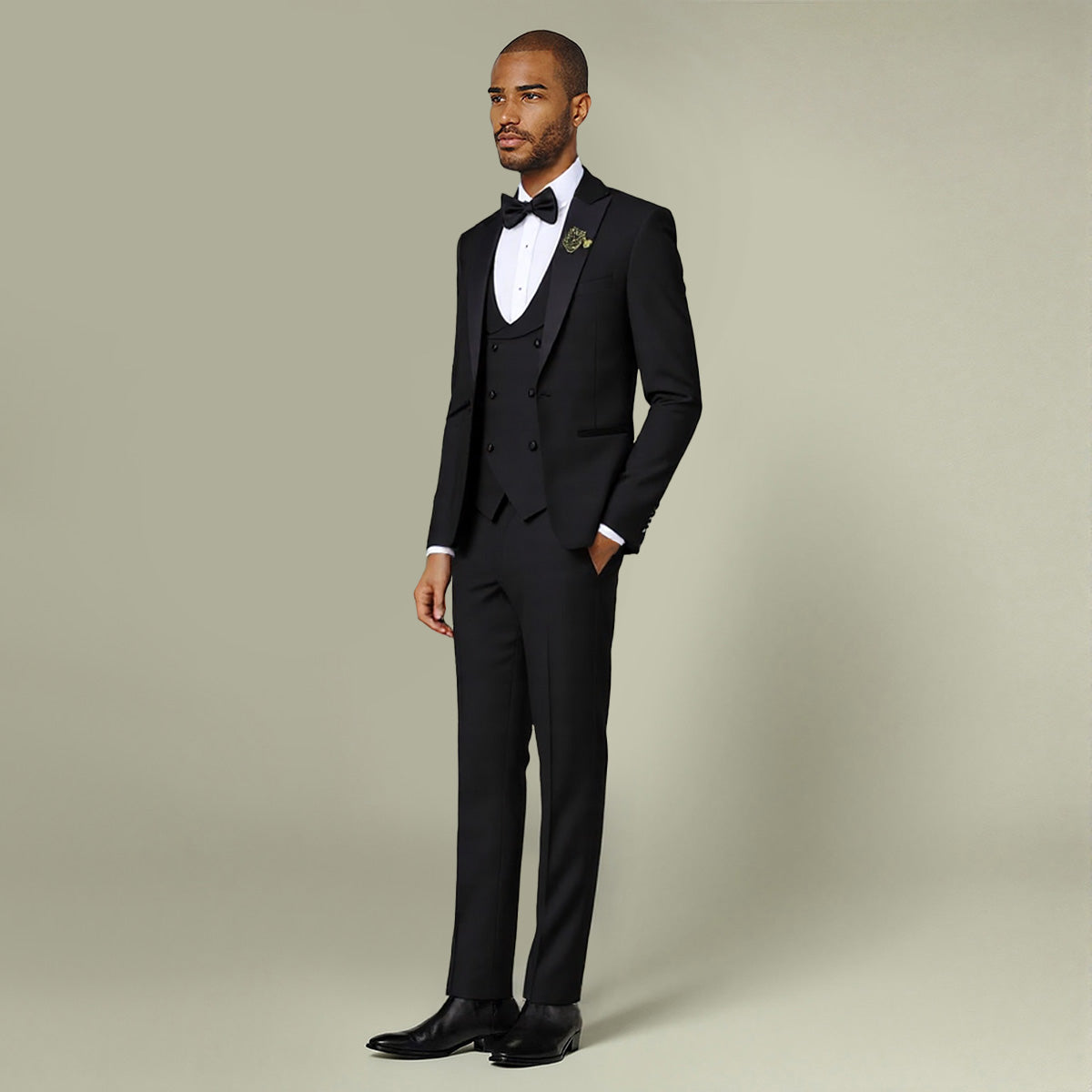Black # Men's 3-piece tuxedo suit with one-button peaked lapel and slim fit single-breasted closure, black formal blazer jacket with matching vest and flat-front trousers with extended waist strap, elegant wedding tuxedo for prom, party, business and formal occasions, isolated on white background.