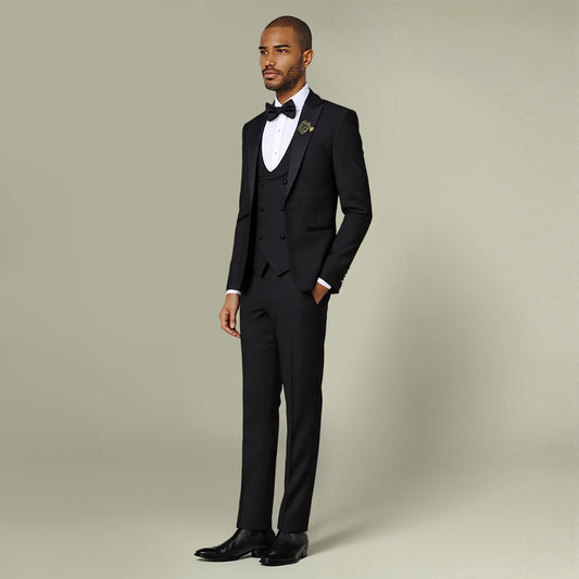 Black # Men's 3-piece tuxedo suit with one-button peaked lapel and slim fit single-breasted closure, black formal blazer jacket with matching vest and flat-front trousers with extended waist strap, elegant wedding tuxedo for prom, party, business and formal occasions, isolated on white background.