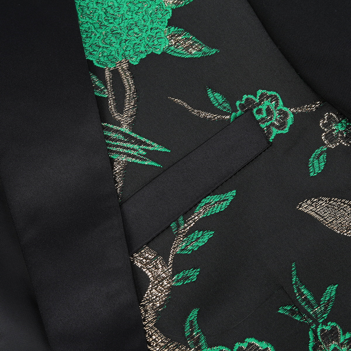 Green # Men's slim fit 2-piece embroidered floral suit with notched lapel and single-breasted button closure, green formal blazer jacket with center back vent and fully lined interior, matching flat-front trousers for wedding, prom, party and special occasions, isolated on white background.
