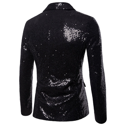 Black # Men's one-button shiny sequin jacket with peaked lapel and single-breasted closure, black party tuxedo blazer with 2 flap hand pockets and cotton blend fabric, sparkling sequin sport coat for prom, wedding, banquet, show and celebration, isolated on white background.