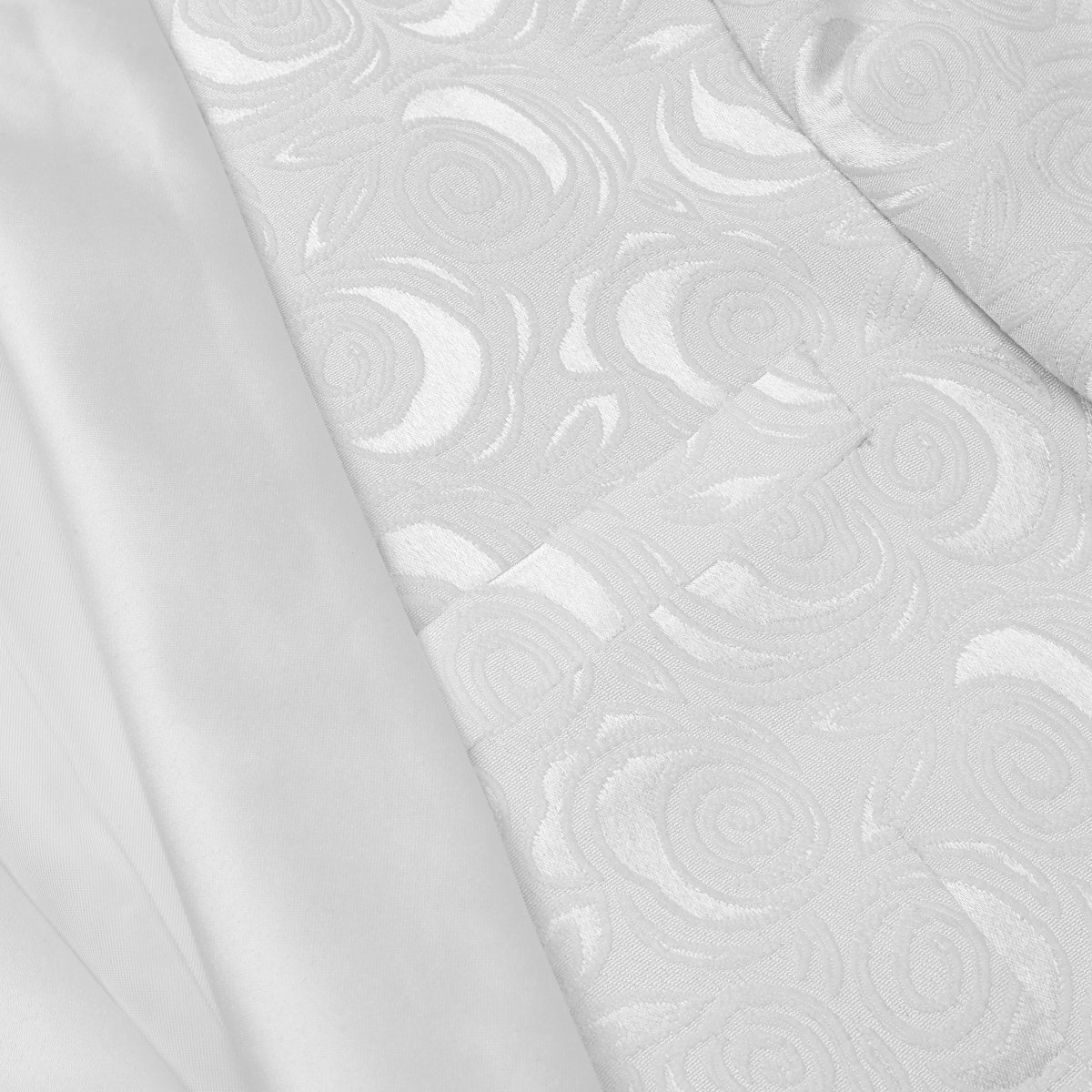 White # Men's slim fit 2-piece paisley suit with satin peaked lapel and single-breasted button closure, white patterned formal blazer jacket with center vent and fully lined interior, matching flat-front trousers, elegant polyester viscose blend suit for wedding, prom, party and formal occasions, isolated on white background.